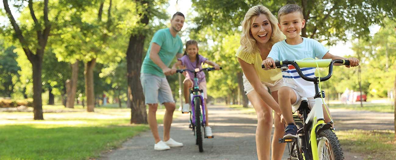 Family riding bikes