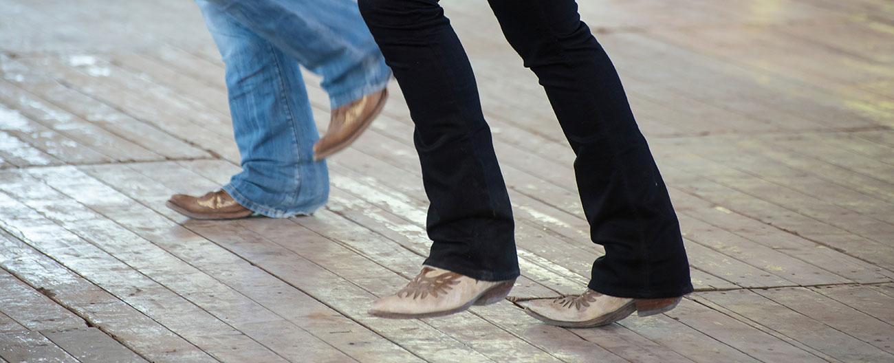 legs and feet of two people dancing