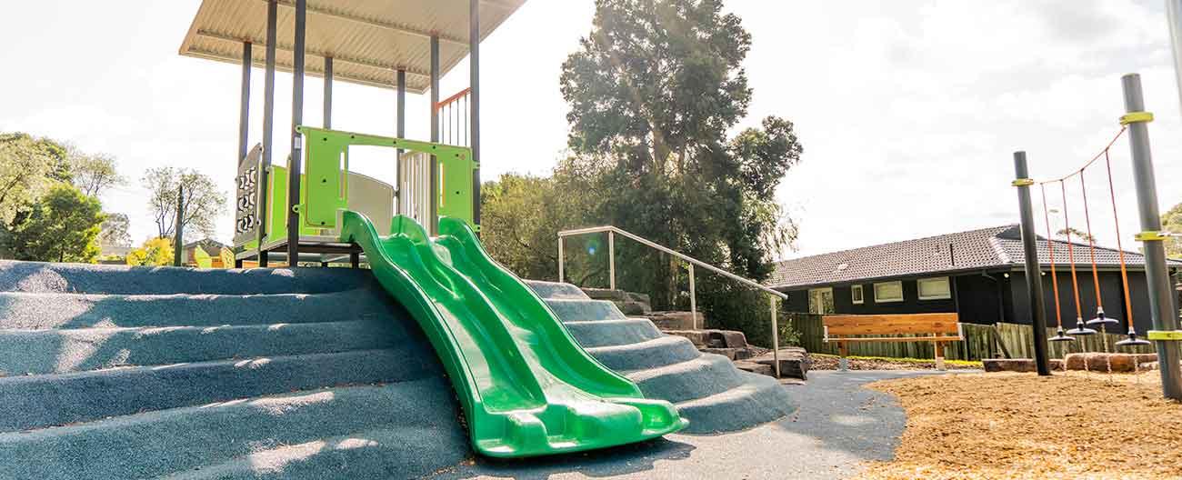 Plaground with green slide