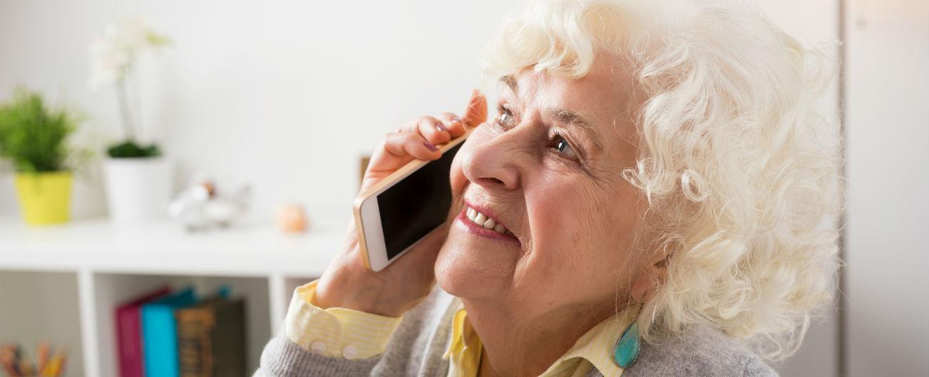 Older woman speaking on mobile phone