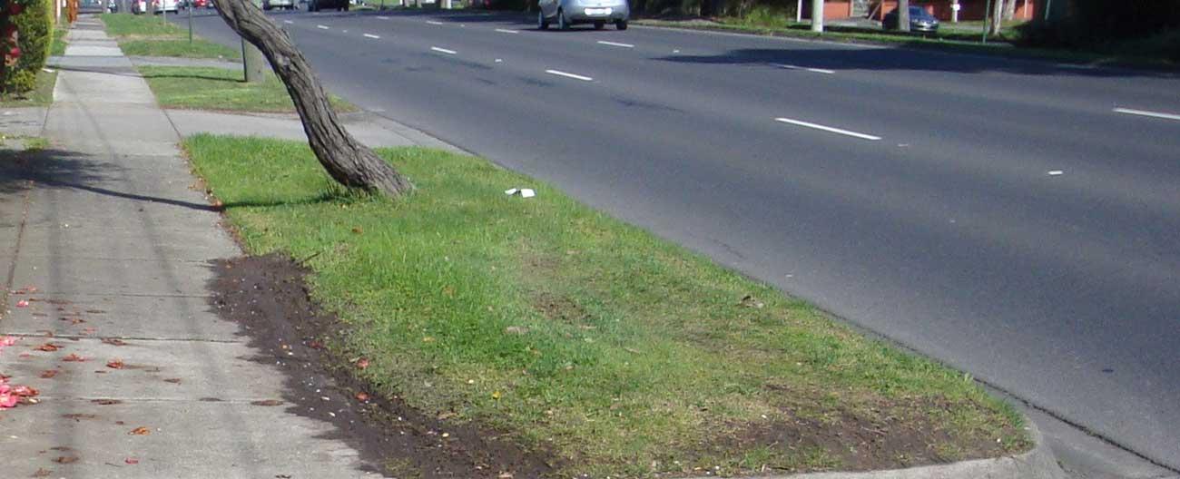 Image of vehicle crossing on arterial road